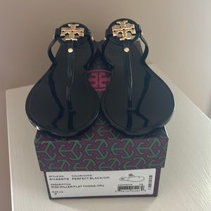 Tory Burch Mini Miller flat thong size 7, runs big I usually wear size 8 in TB.